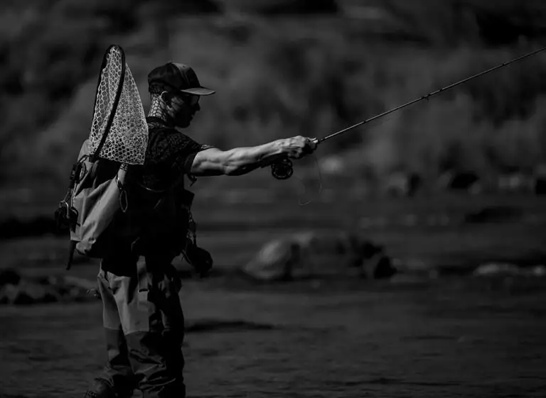 fly fisherman in a river in Nevada